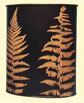 Ochre Fern, hand painted on black background waste bin with black interior.