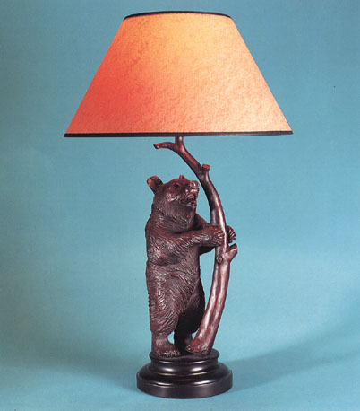 Berliner Bear, simulated carved wood lamp base with 14" empire toffee parchment shade with black trim.
