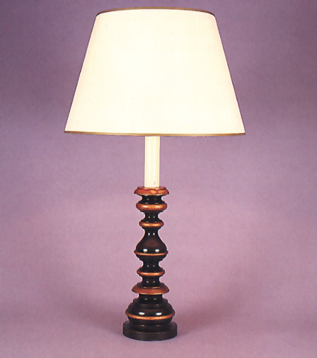 Empress, lamp base black and gold with 17" antique parchment shade with gold trim.