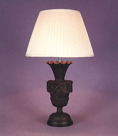 Interlaken, bronzed lamp base with 14" empire hand made pleated silk shade.