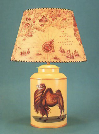 Camel, hand painted tea canister lamp base on ochre background with 17" columbus parchment shade with leather thonging.
