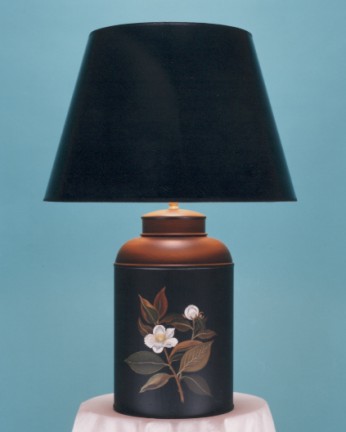 Mrs Delaney, tea canister lamp base, hand painted Stewartia Malacodendron on black background with 17" sprayed black shade with gold interior and black trim.