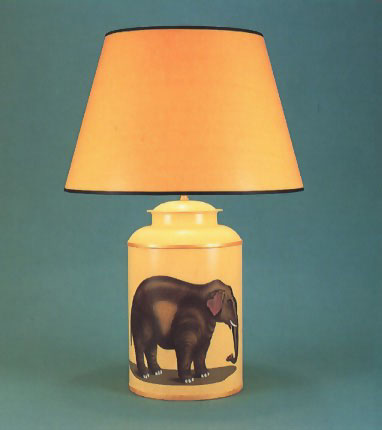 Elephant, hand painted tea canister lamp base on ochre background with 17" hand painted dark yellow shade with black trim.