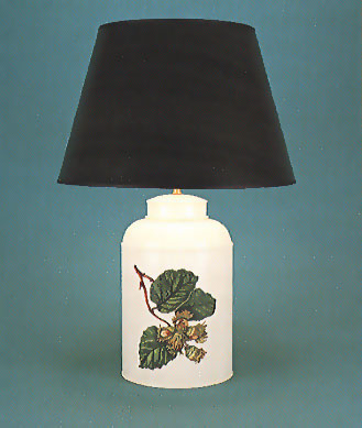 Fabulous Fruit, tea canister lamp base, hand painted Hazlenut on barley white background with 17" hand painted dark green shade with black trim.
