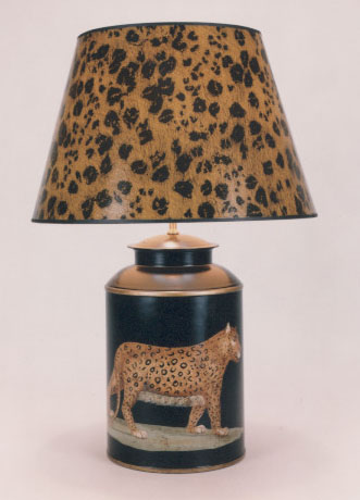 Leopard, hand painted tea canister lamp base, leopard on black background with 17" skin leopard shade with black trim.
