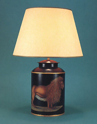 Lion, hand painted tea canister lamp base on black background with 17" antique parchment shade with gold trim.