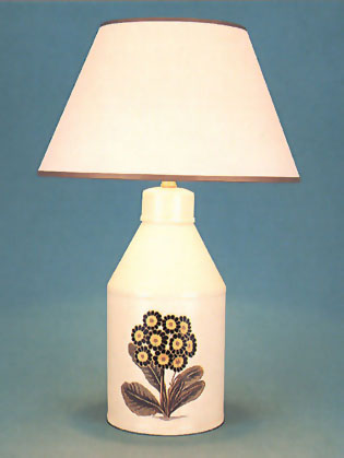 Primula, tea canister lamp base hand painted sea shore on barley white background with 11" cream card shade with gold trim.